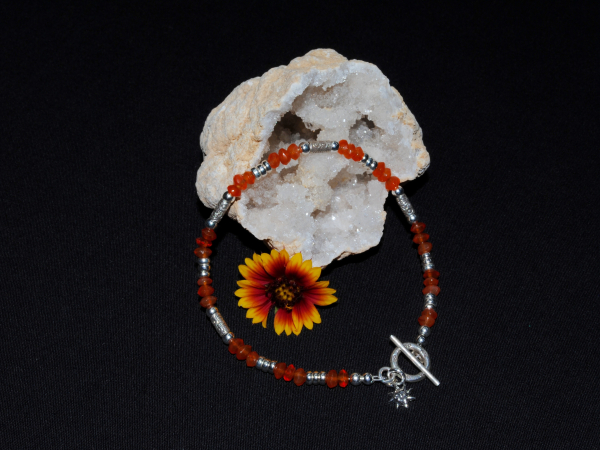 Faceted 4mm carnelian and sterling silver beaded bracelet.